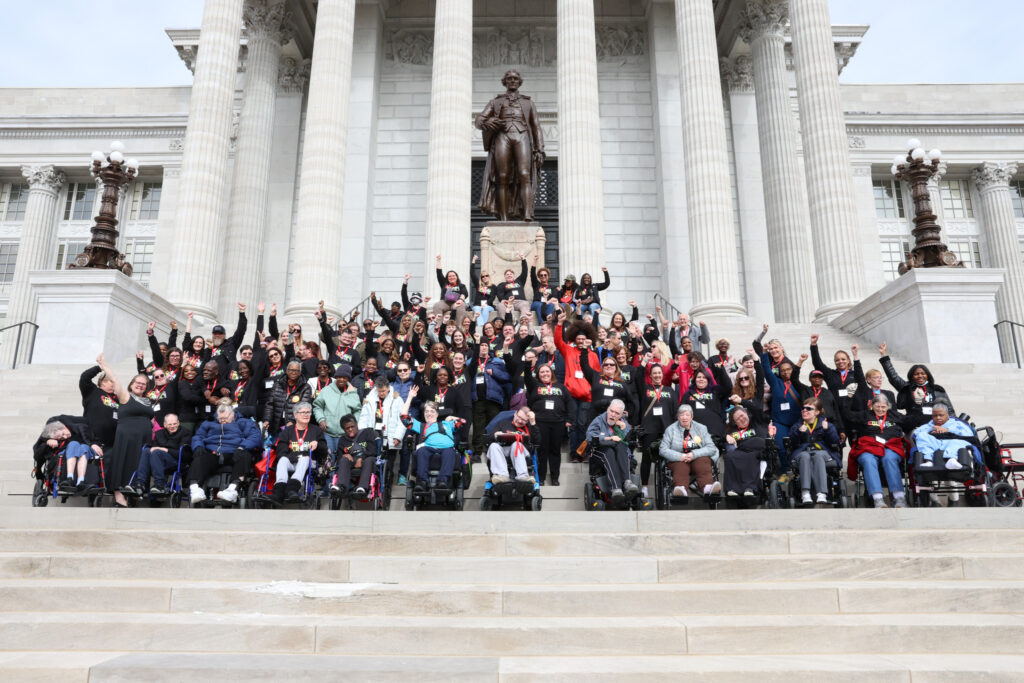 Emmaus self-advocates, staff, and supporters gathered on the Missouri State Capitol steps for Disability Rights Legislative Day.