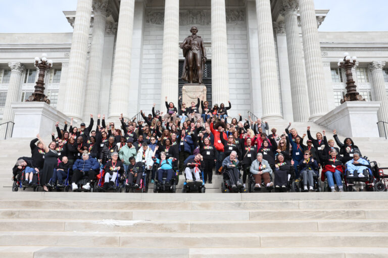 Emmaus self-advocates, staff, and supporters gathered on the Missouri State Capitol steps for Disability Rights Legislative Day.