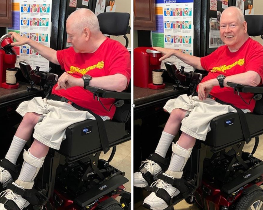 Emmaus client, Pat, using his new wheelchair lift