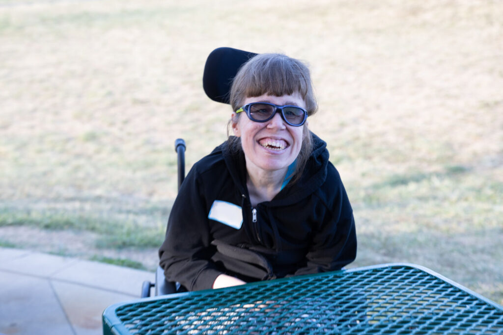 Lady in Wheelchair at Emmaus Homes Event