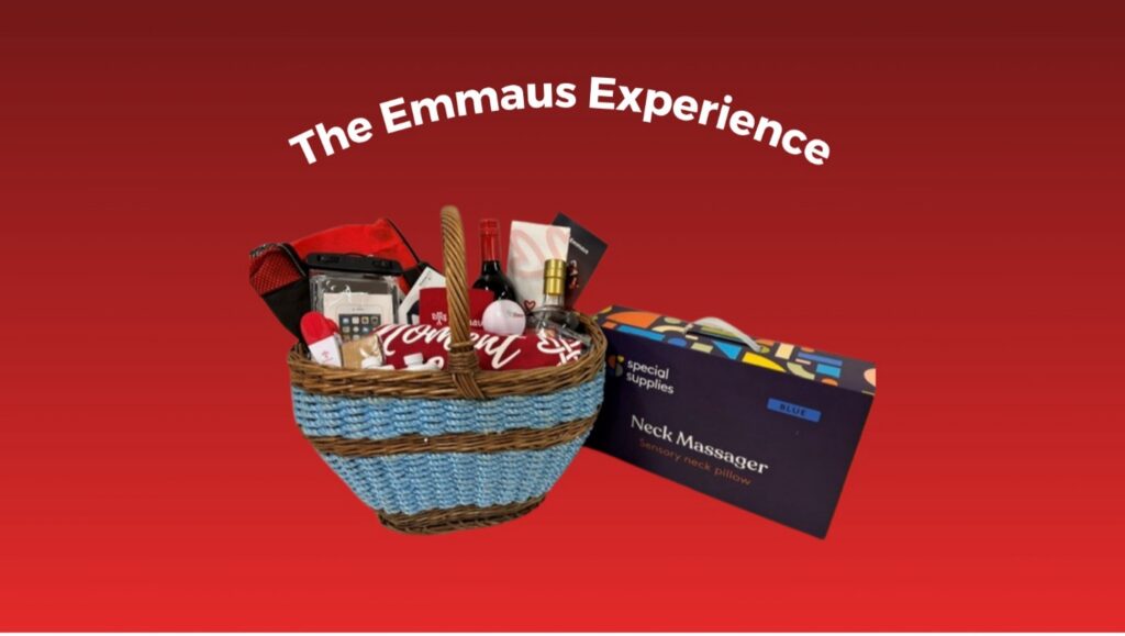 Emmaus Auction "The Emmaus Experience" basket featuring wine, gift cards, electronics, relaxation items, and premium prizes