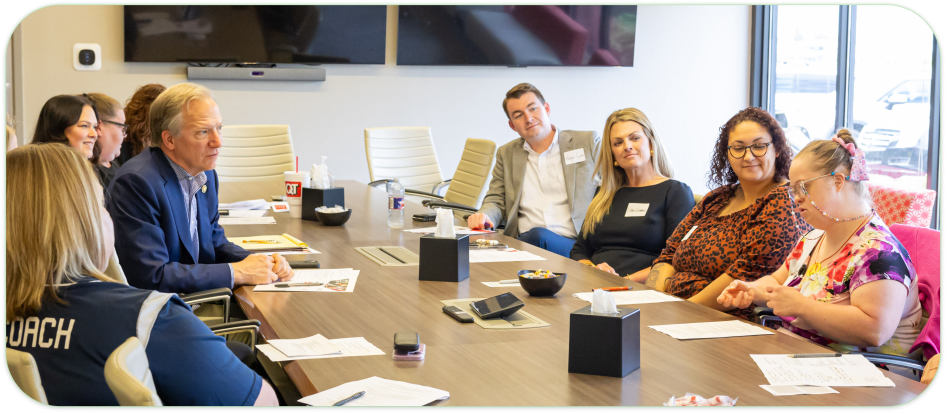 Advocate Image Group at Table