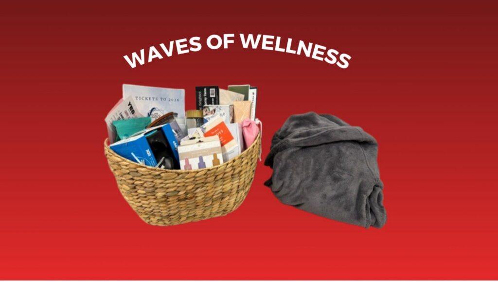 Emmaus Auction wellness basket featuring self-care products, spa items, a cozy blanket, and two tickets to Waves of Inspiration.